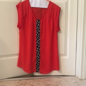 Red top with navy/white decoration front/back